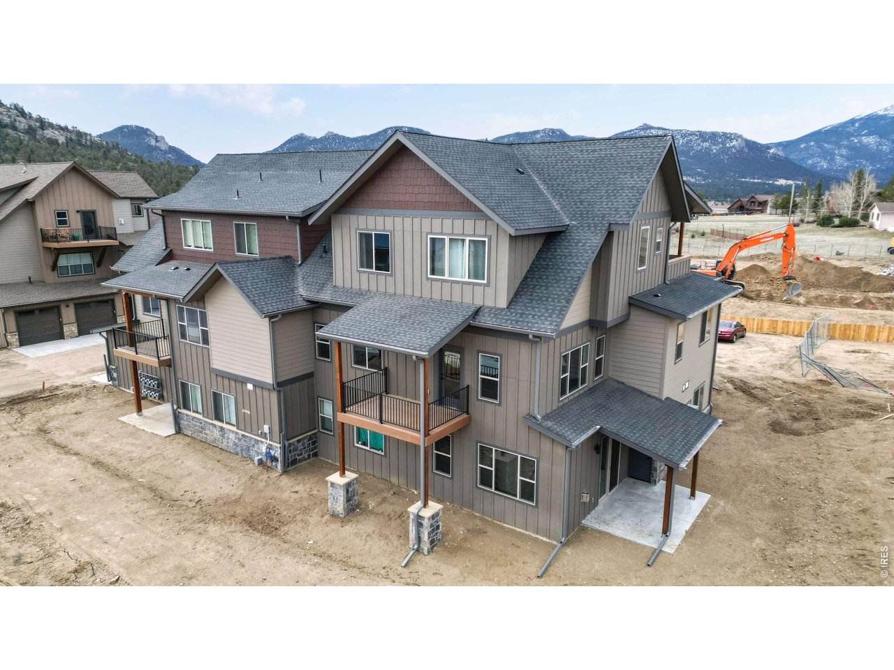 1734 Wildfire Road, Unit 204 Estes Park, CO 80517 - Photo 27 of 31 a aerial view of a house with a yard and sitting area