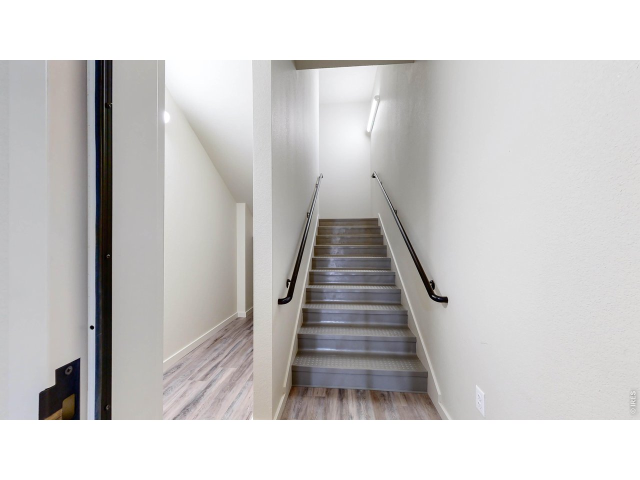 1734 Wildfire Road, Unit 204 Estes Park, CO 80517 - Photo 10 of 31 a black and white photo of a living room