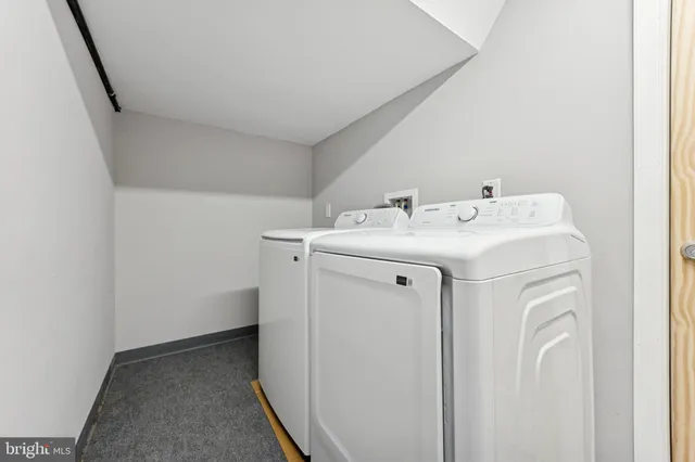 a bathroom with a sink a toilet and a bathtub
