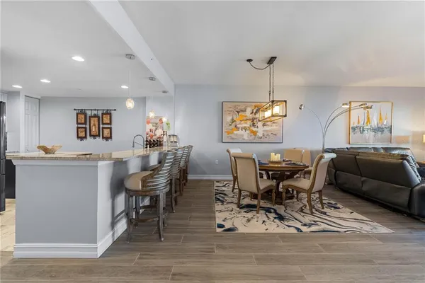 a bedroom with a bed window and a dresser