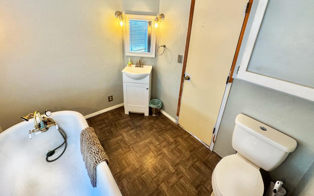 6330 Caldor Road Somerset, CA 95684 - Photo 20 of 30 a bathroom with a toilet and a sink