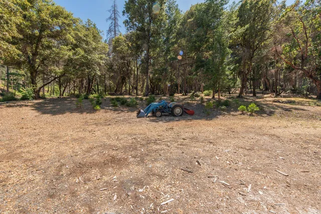 a view of backyard of a house