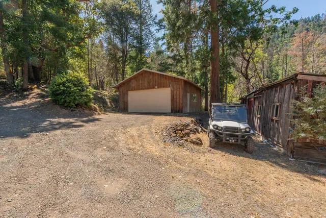 a view of a chairs and table in patio