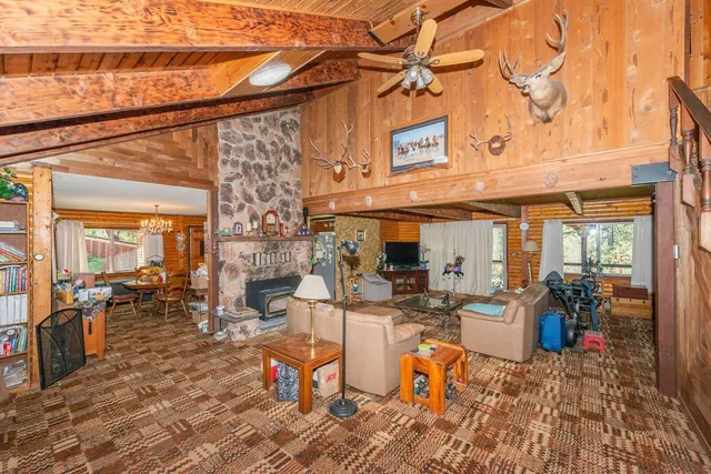 a view of a chairs and table in a patio