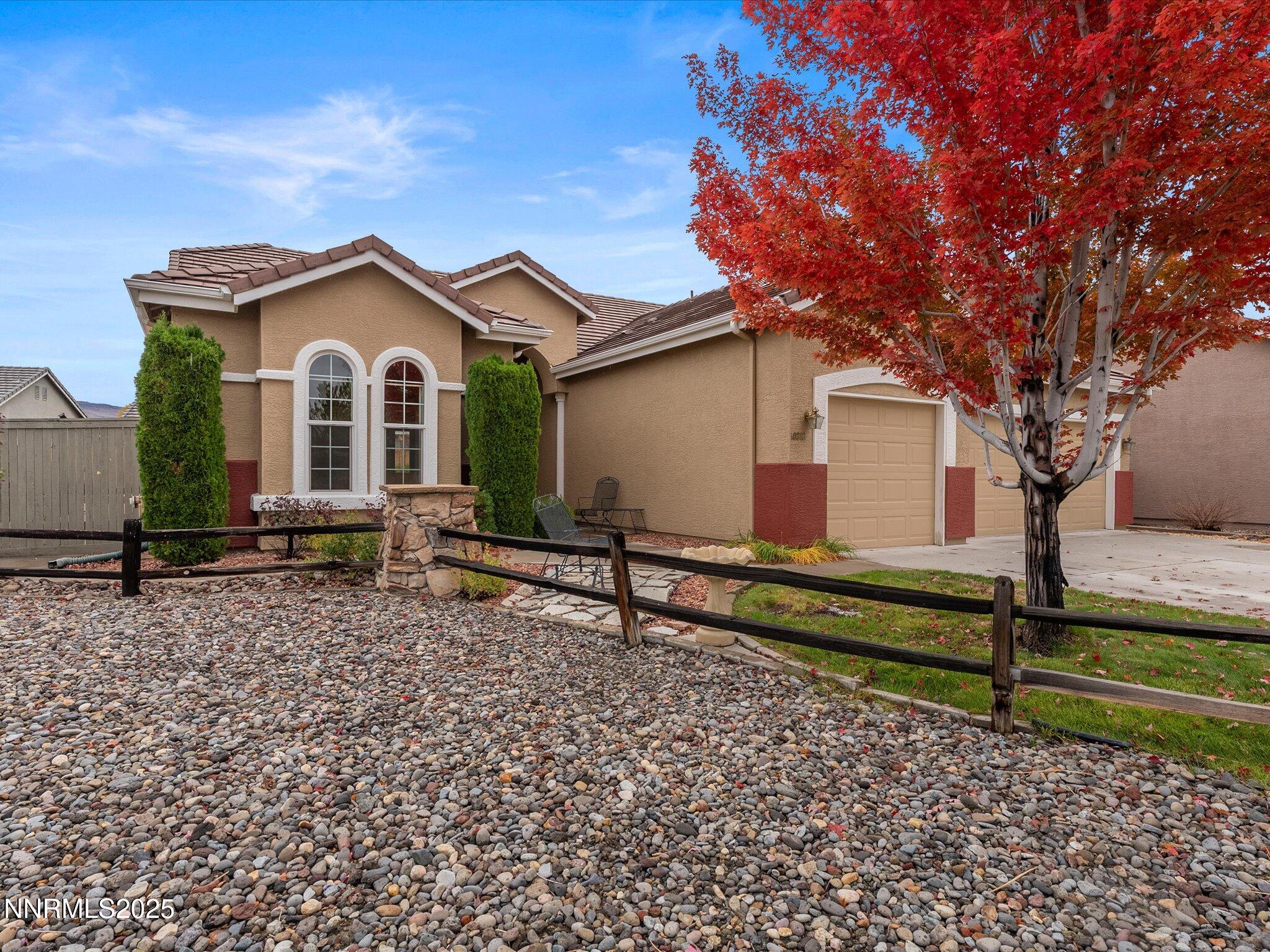 10316 Sterling View Court Reno, NV 89521 - Photo 2 of 41 a house view with a garden space