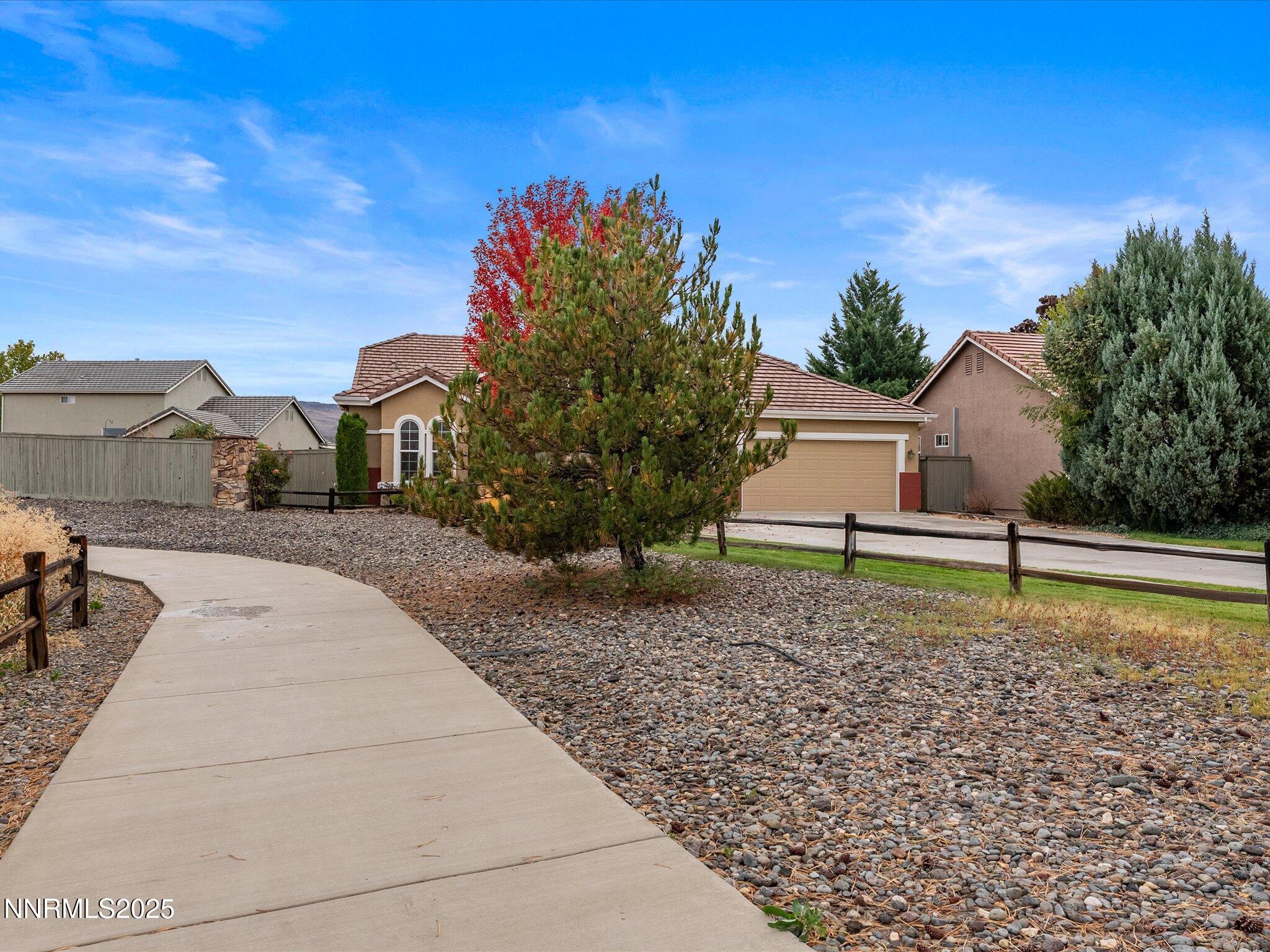 10316 Sterling View Court Reno, NV 89521 - Photo 36 of 41 a house with trees in the background