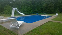 1104 Promise Land Road Charlotte, TN 37036 - Photo 3 of 20 Gorgeous in-ground pool... This picture was taken in the summer... It's currently covered.