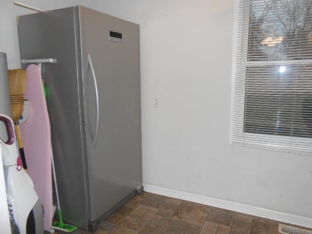 1104 Promise Land Road Charlotte, TN 37036 - Photo 9 of 20 Freezer in utility room remains