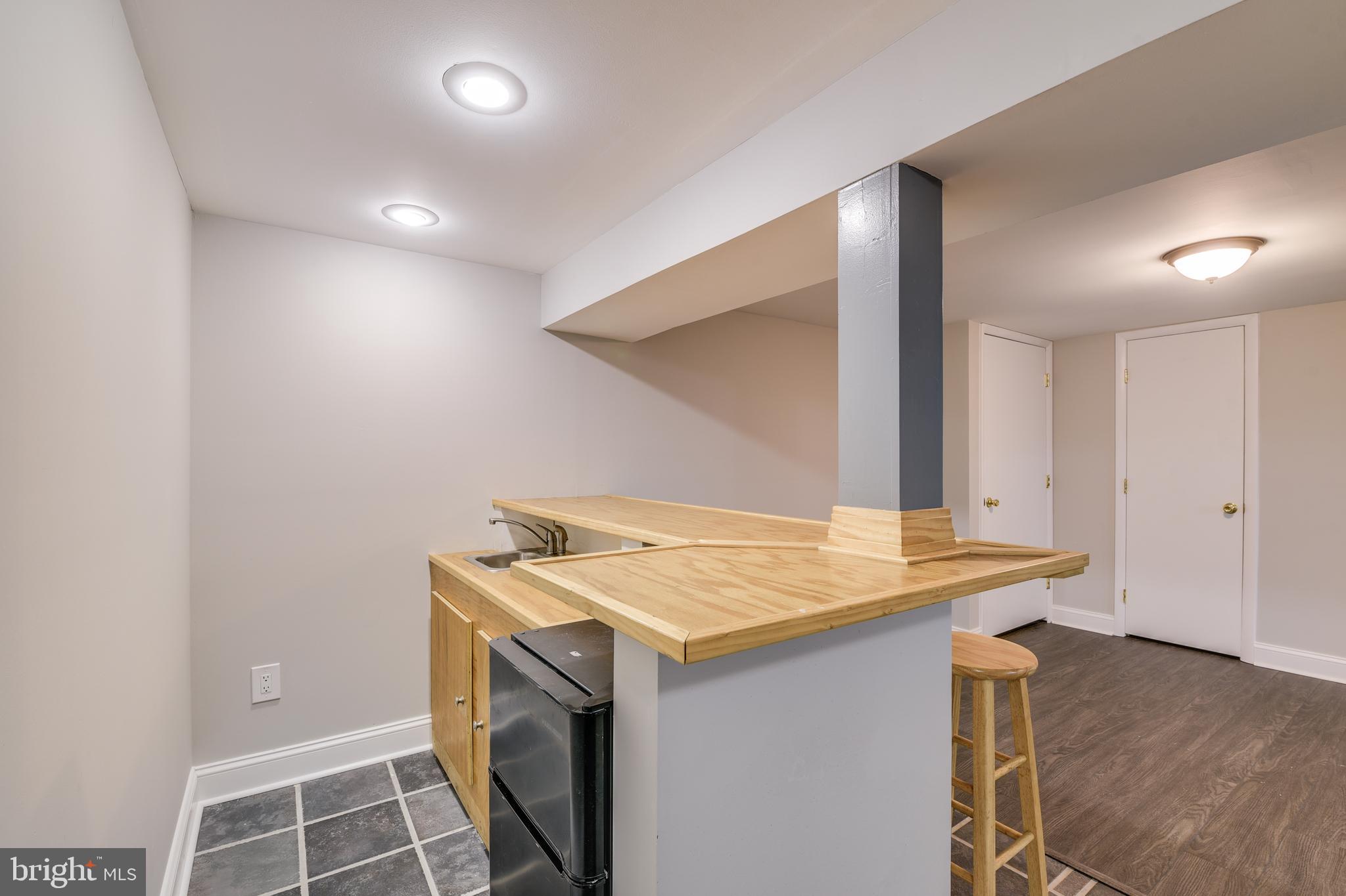 8408 Maryland Road Pasadena, MD 21122 - Photo 35 of 47 Lower Level Basement Wet Bar