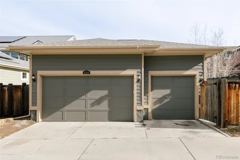 a view of balcony with a table and chairs