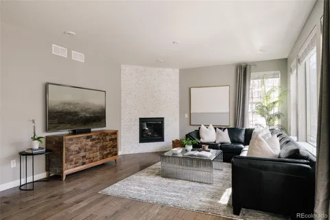 a bathroom with a toilet a sink and a mirror