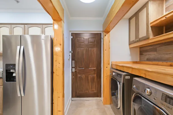 a view of a kitchen with appliances and cabinets