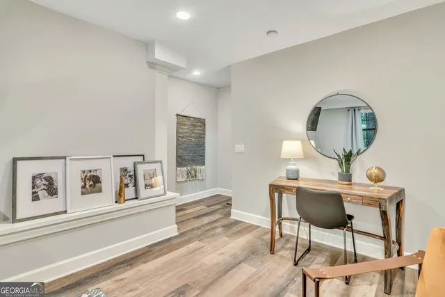 a workspace with furniture and window