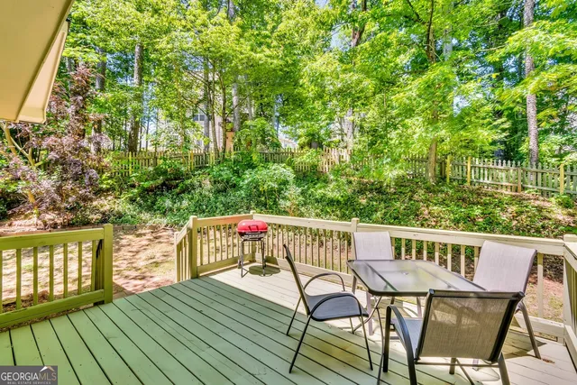 a view of a chairs on the roof deck