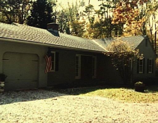 1060 Ridgefield Road Wilton, CT 06897 - Photo 1 of 1 a backyard of a house
