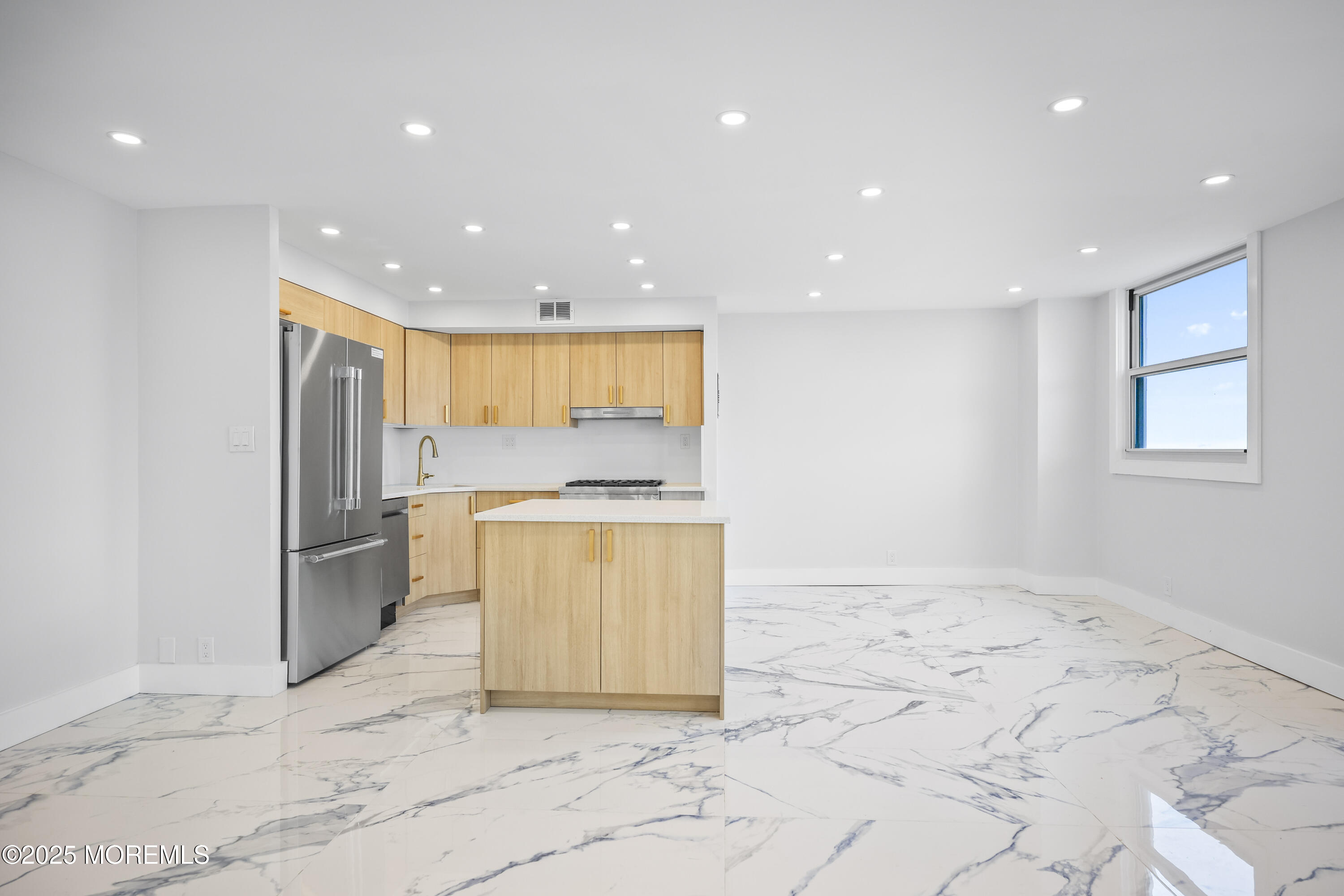 675 Ocean Avenue, Unit 9F Long Branch, NJ 07740 - Photo 22 of 31 a view of kitchen with stainless steel appliances granite countertop refrigerator and oven