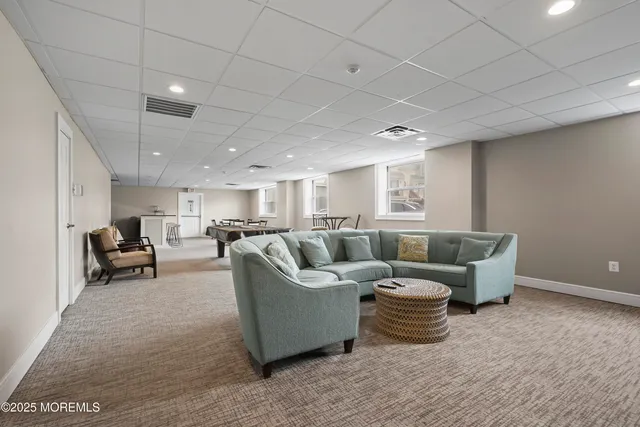 a room with furniture and wooden floor