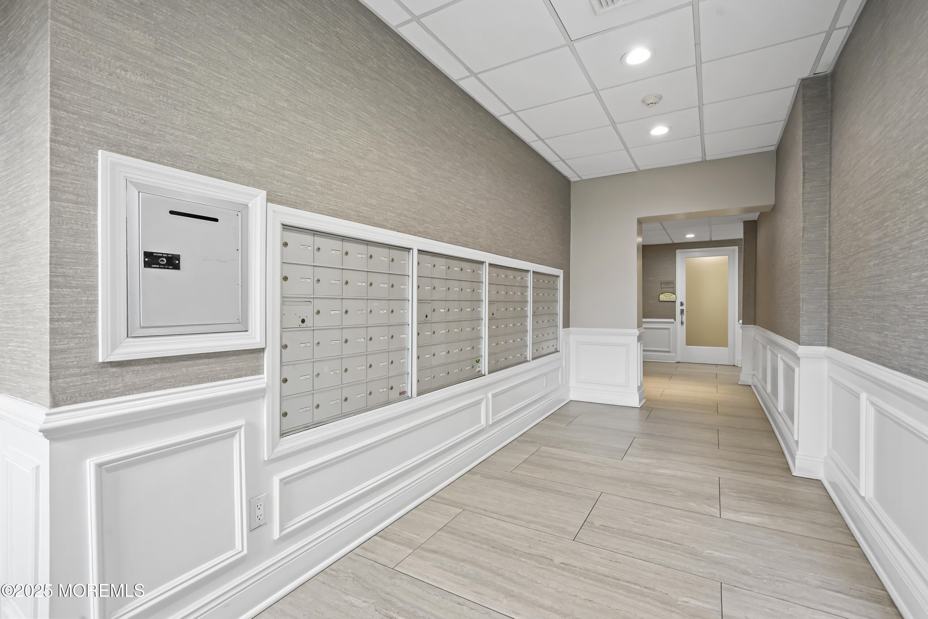 675 Ocean Avenue, Unit 9F Long Branch, NJ 07740 - Photo 29 of 31 a view of a hallway with wooden floor and entryway