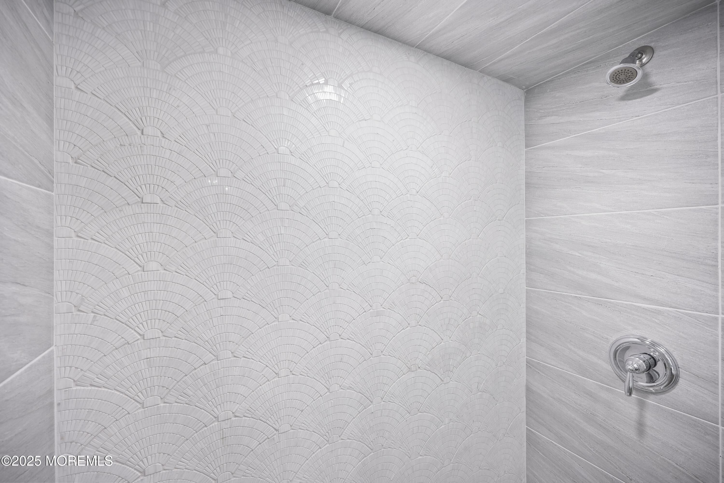 675 Ocean Avenue, Unit 9F Long Branch, NJ 07740 - Photo 4 of 31 a bathroom with a shower