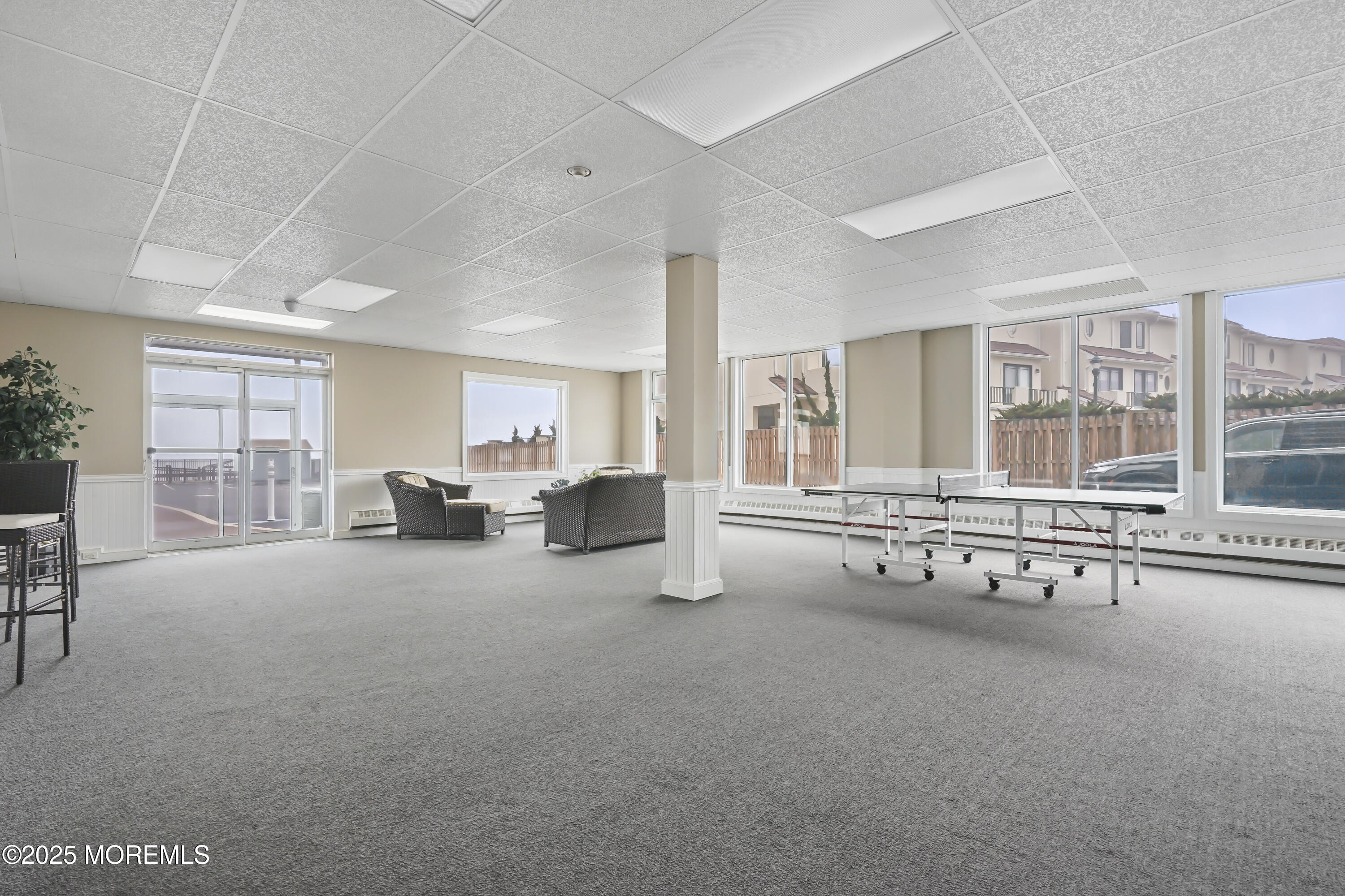 675 Ocean Avenue, Unit 9F Long Branch, NJ 07740 - Photo 9 of 31 a room with furniture and window