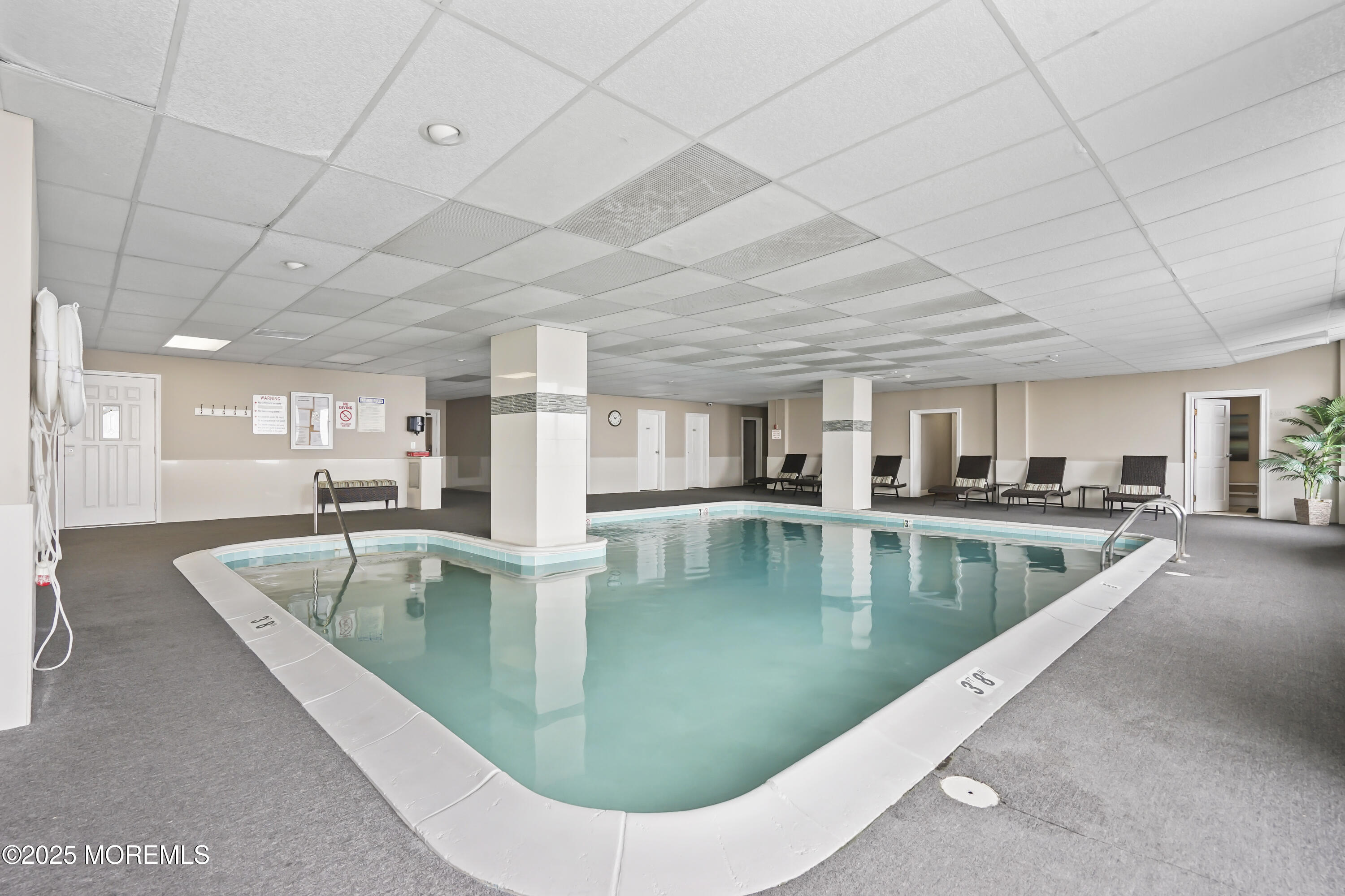 675 Ocean Avenue, Unit 9F Long Branch, NJ 07740 - Photo 10 of 31 a view of a swimming pool with outdoor seating