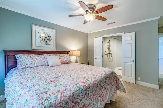 a bathroom with a shower a sink and a mirror