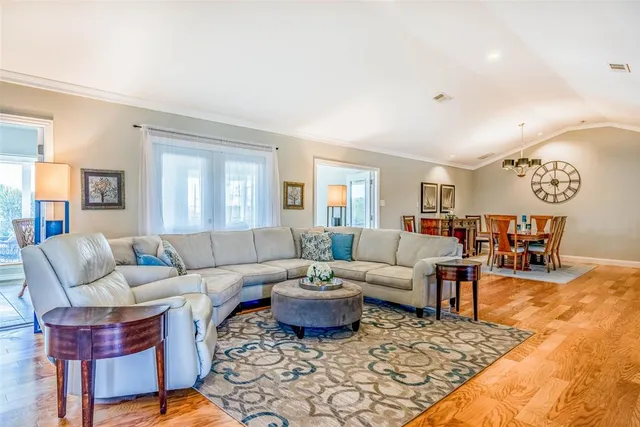 a living room with furniture and a couch