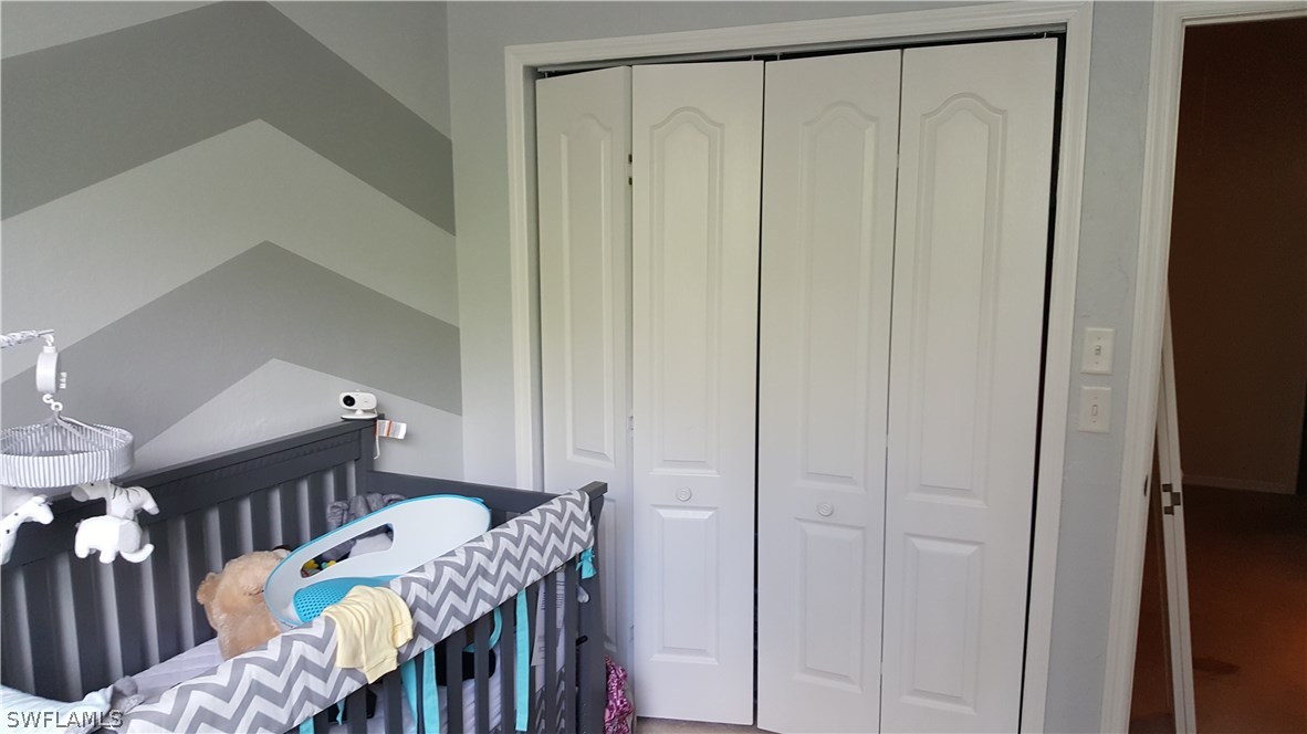 3829 Schoolhouse Road East, Unit 3 Fort Myers, FL 33916 - Photo 14 of 18 a view of hallway with furniture