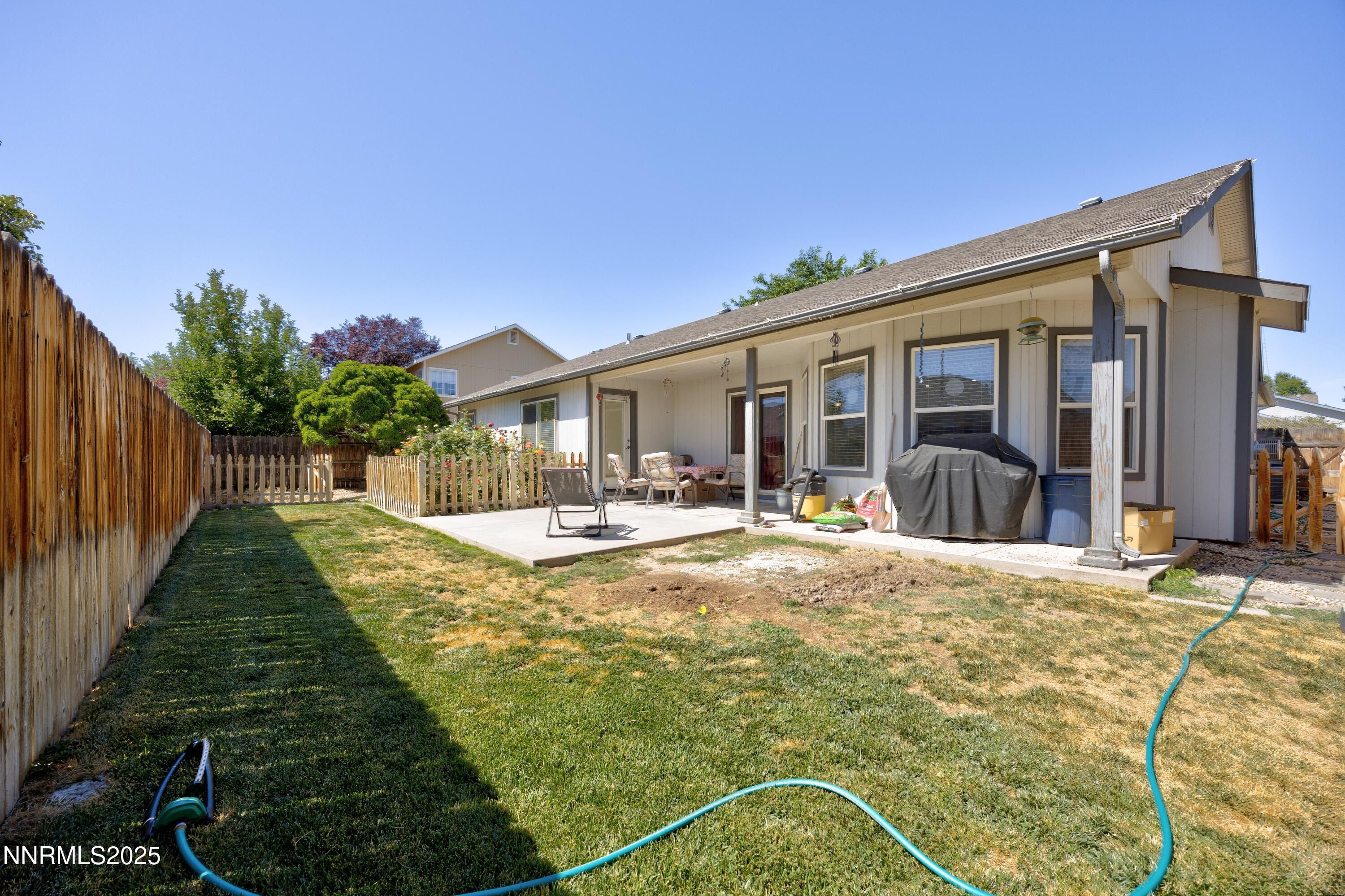 714 Noel Lane Fallon, NV 89406 - Photo 19 of 21 a view of a house with backyard and porch