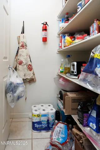 a room with toys and a wooden floor