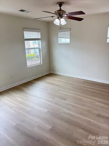 a bathroom with a shower and a sink