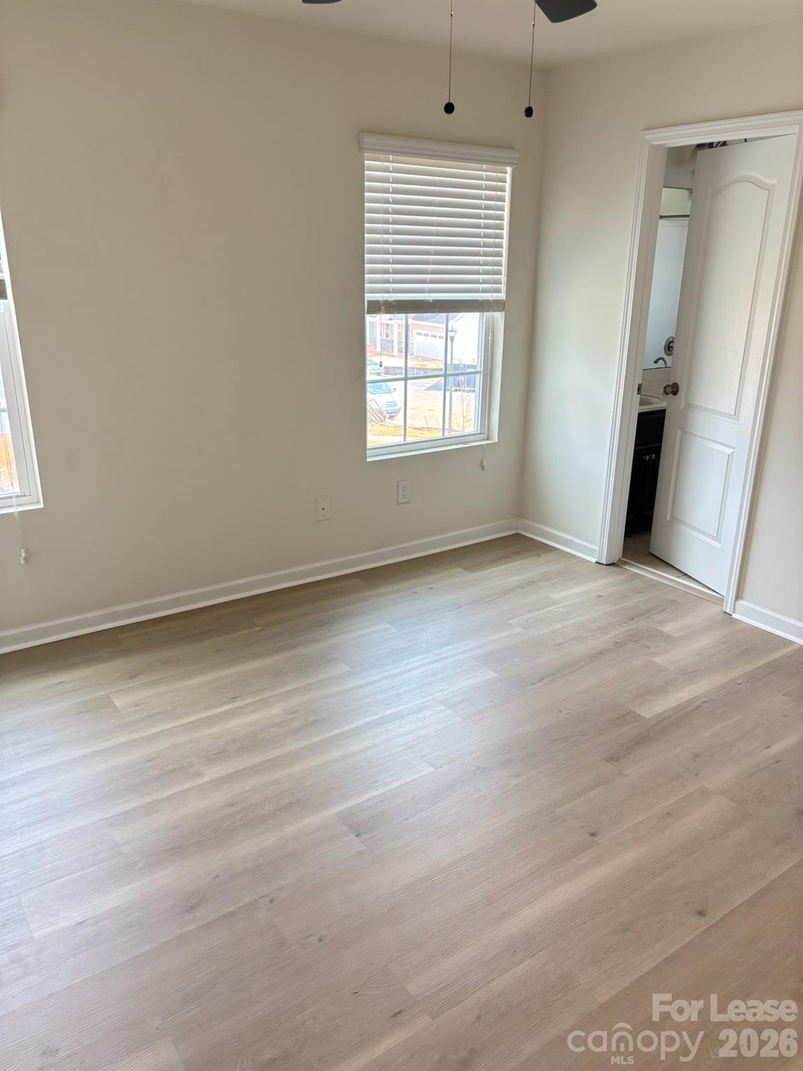 17924 Ragtop Day Lane Cornelius, NC 28031 - Photo 42 of 47 an empty room with window and refrigerator