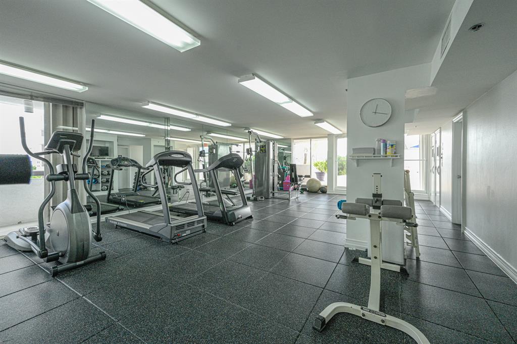 1775 Washington Avenue, Unit 5A Miami Beach, FL 33139 - Photo 15 of 21 a view of a room with gym equipment