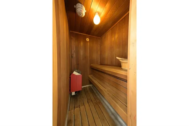 a en suite bathroom with a sink and a mirror