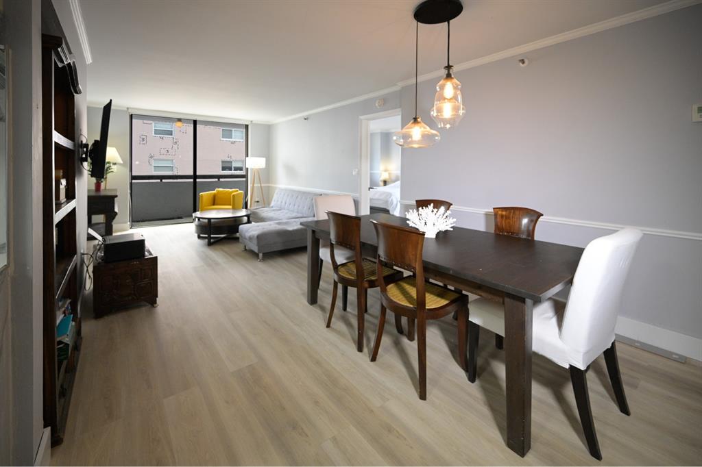 1775 Washington Avenue, Unit 5A Miami Beach, FL 33139 - Photo 3 of 21 a view of a livingroom and dining room