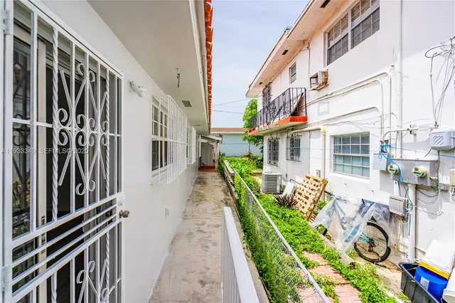 a house view with a backyard space