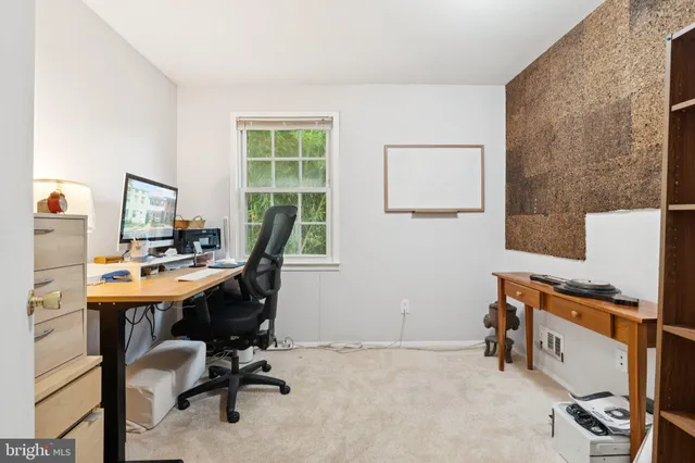 a room with furniture and a window