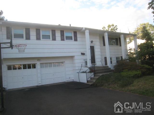 22 King Road Somerset, NJ 08873 - Photo 1 of 19 a view of a house with backyard