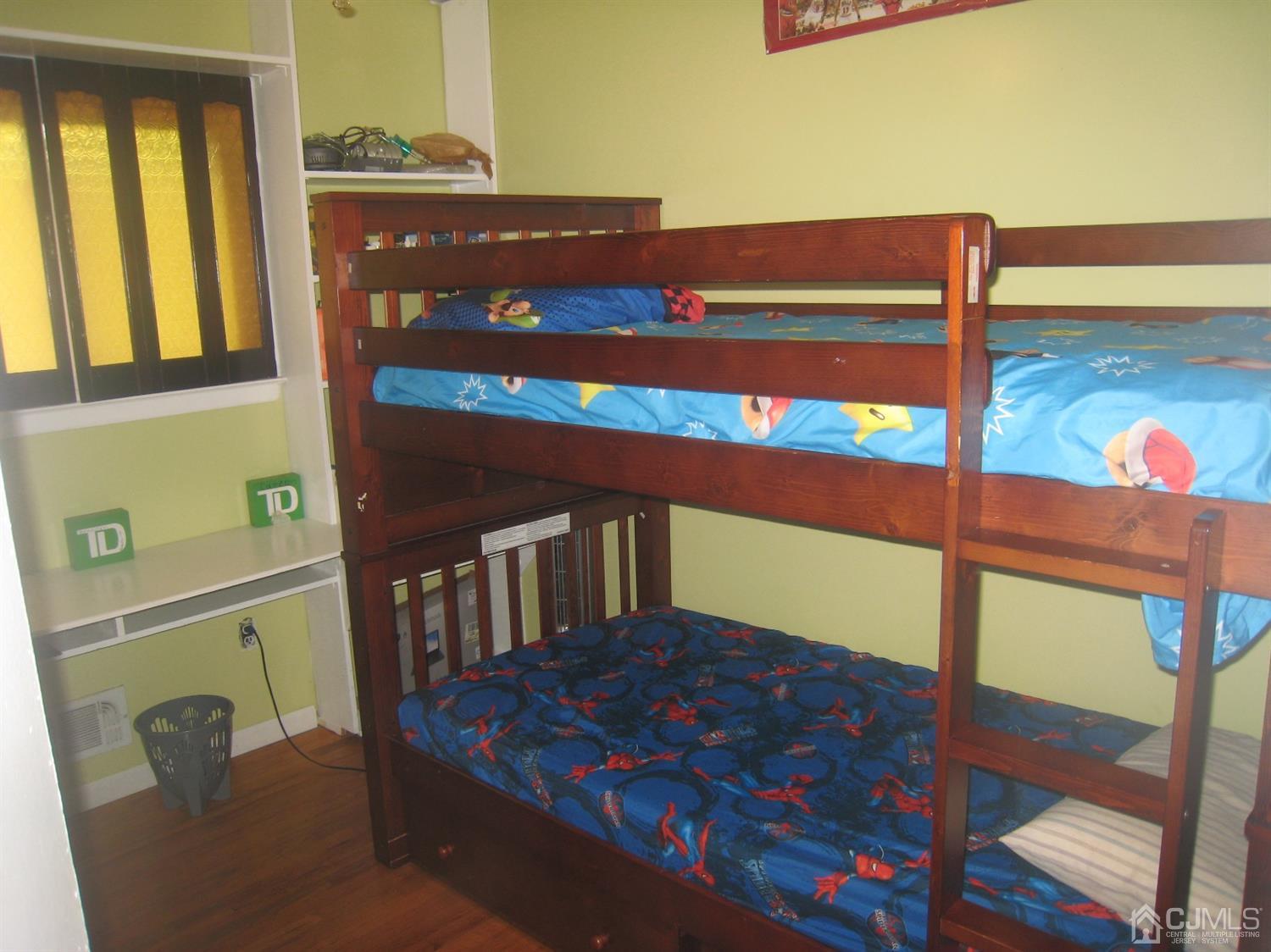 22 King Road Somerset, NJ 08873 - Photo 13 of 19 a bedroom with a bed and wooden floor