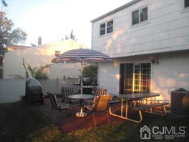 22 King Road Somerset, NJ 08873 - Photo 16 of 19 a view of a house with backyard and sitting area