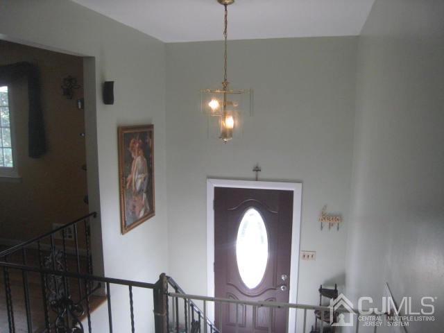 22 King Road Somerset, NJ 08873 - Photo 3 of 19 a close view of light fixtures and wooden floor