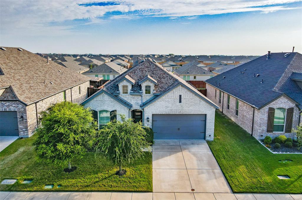 2032 Longbridge Road Forney, TX 75126 - Photo 2 of 40 a aerial view of a house next to a yard