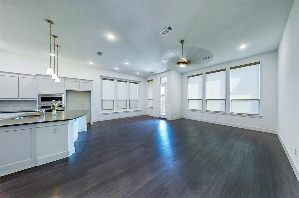 2032 Longbridge Road Forney, TX 75126 - Photo 21 of 40 a view of kitchen with sink microwave and stove