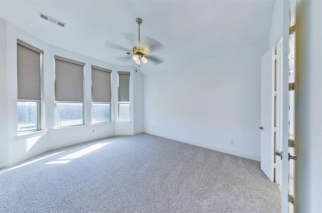 2032 Longbridge Road Forney, TX 75126 - Photo 22 of 40 a view of an empty room with a window