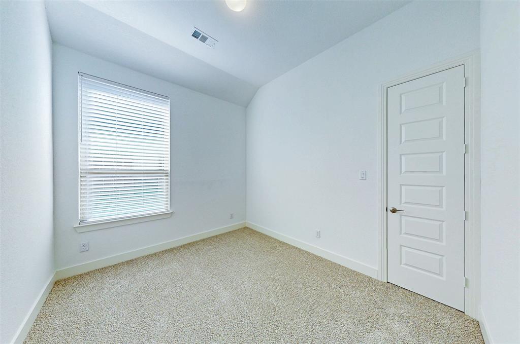 2032 Longbridge Road Forney, TX 75126 - Photo 32 of 40 an empty room with a window