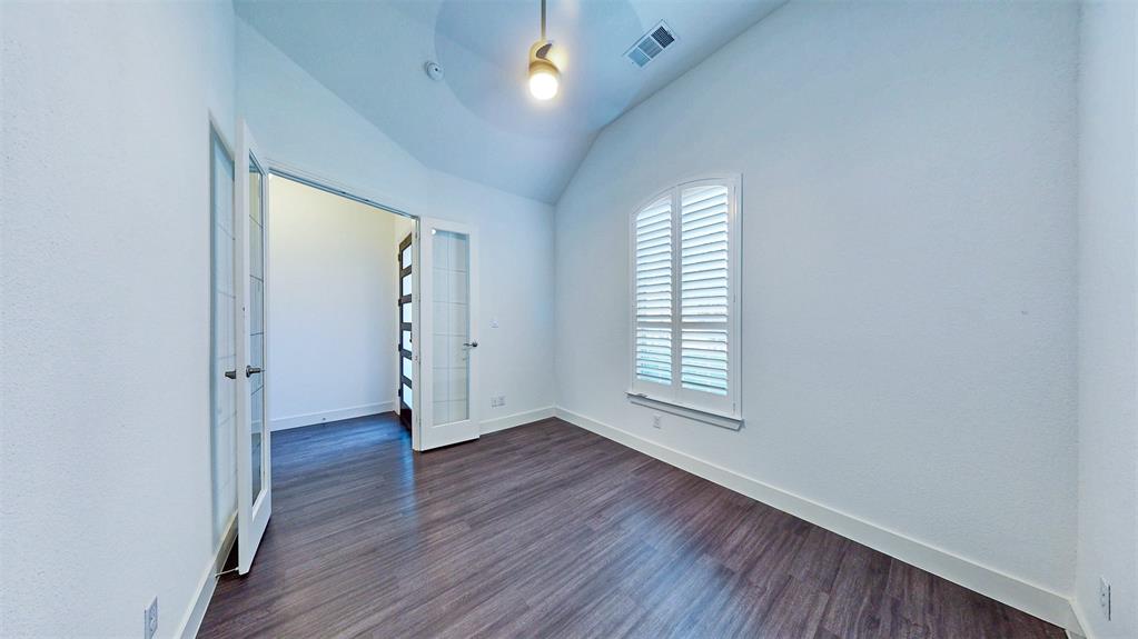 2032 Longbridge Road Forney, TX 75126 - Photo 7 of 40 an empty room with wooden floor and windows