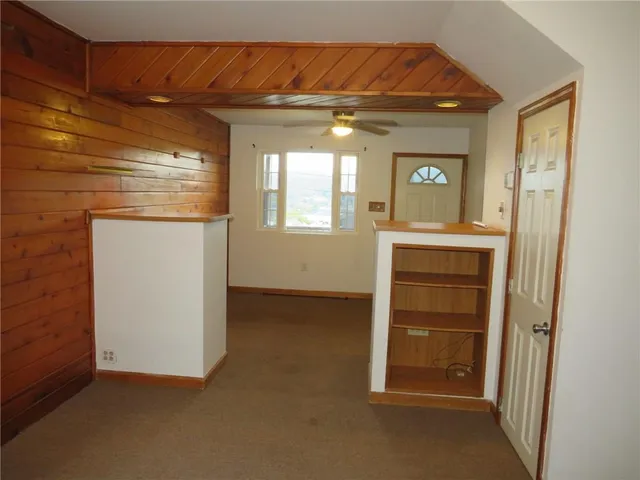 a kitchen with a refrigerator sink and stove