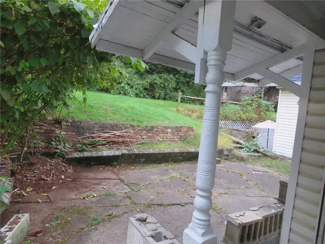 a view of a backyard of a house