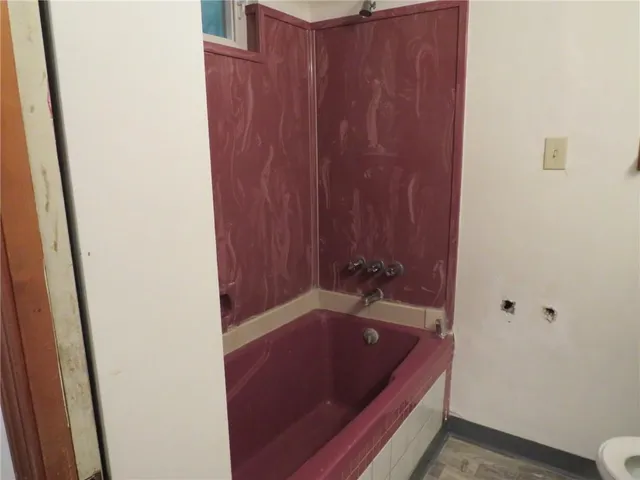 a bathroom with a toilet