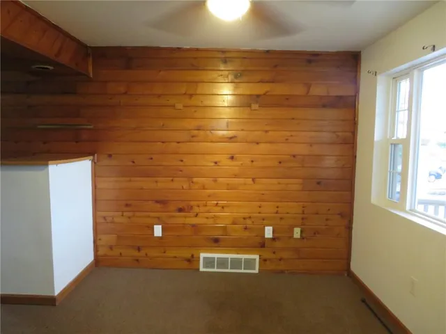 a view of a utility room with closet